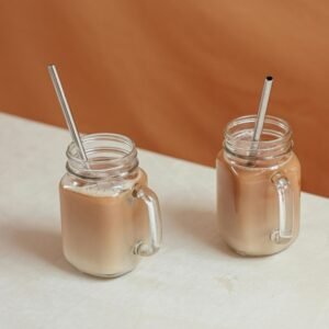 traditional Sri Lankan milk coffee in a cup on wooden table