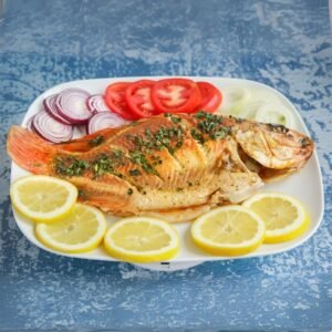 traditional Sri Lankan fried fish served with lemon