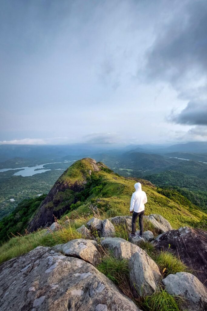 View of Sri Lankan hills covered with mist during a hiking trip