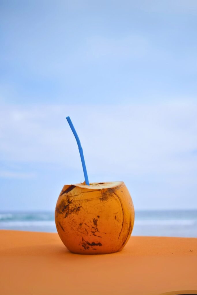 King coconut beverage sold by a beach vendor