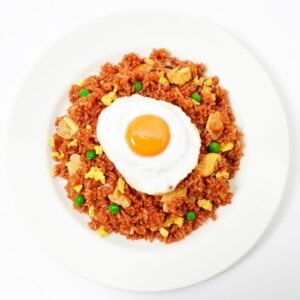 colorful plate of nasi goreng with garnishes in Sri Lanka