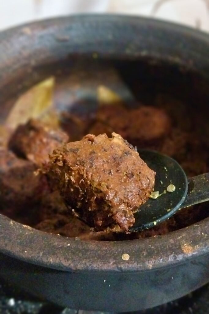 Traditional Sri Lankan fish ambulthiyal served on a clay plate