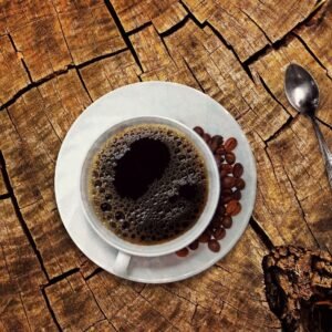 cup of freshly brewed Sri Lankan coffee on wooden table