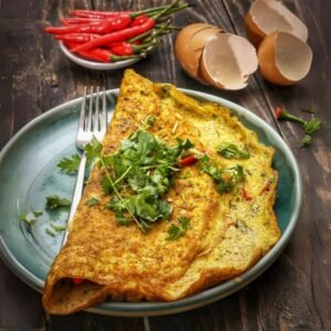 Traditional Sri Lanka breakfast with bulls eye egg and omlet
