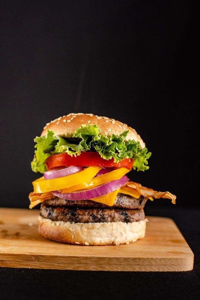 Crispy Sri Lankan chicken burger with lettuce and cheese