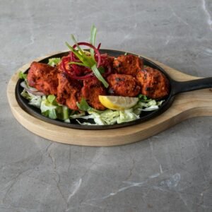 Spicy Thanduri chicken served on a plate in Sri Lanka