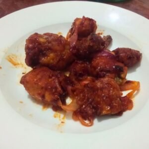 fiery devil chicken with local spices in Sri Lanka