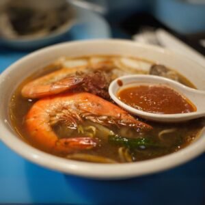 coconut-based Sri Lankan prawn curry with chili and herbs