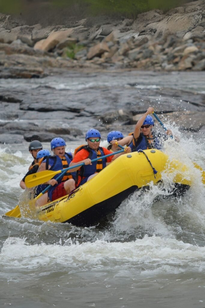 Tourists enjoying white water rafting in Sri Lanka