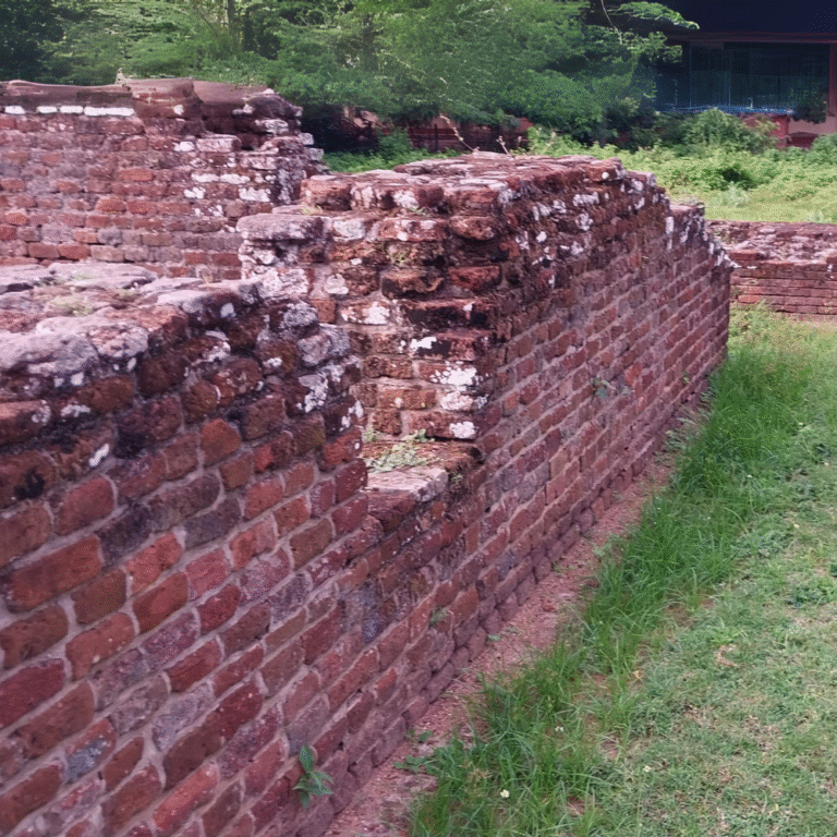 Historic Wijayaba Palace architecture surrounded by greenery