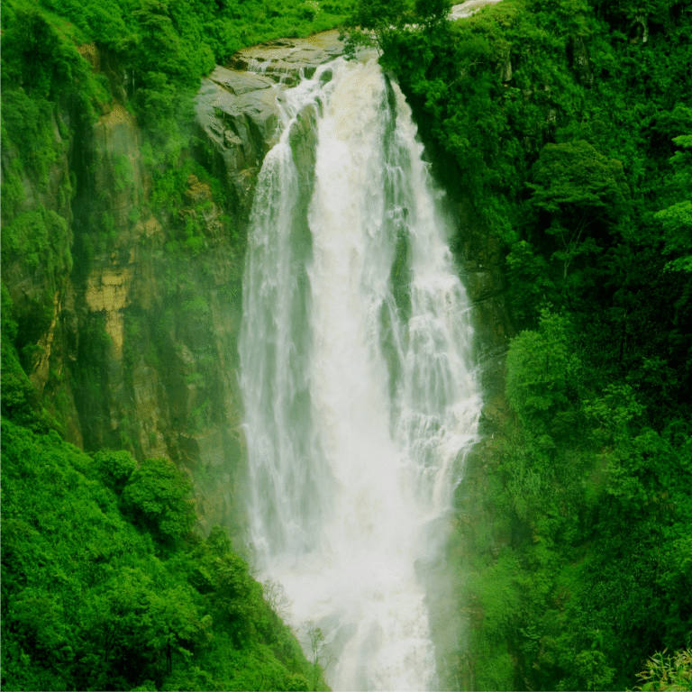 mist rising from Devon Falls waterfall in the hill country