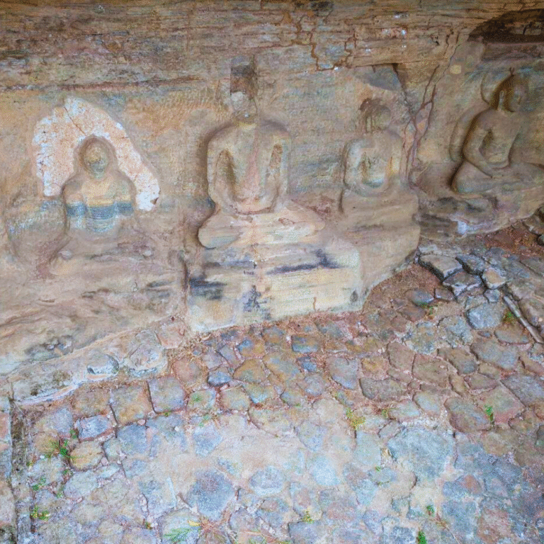 Buddha statue carved in stone at Kuda Gal Viharaya
