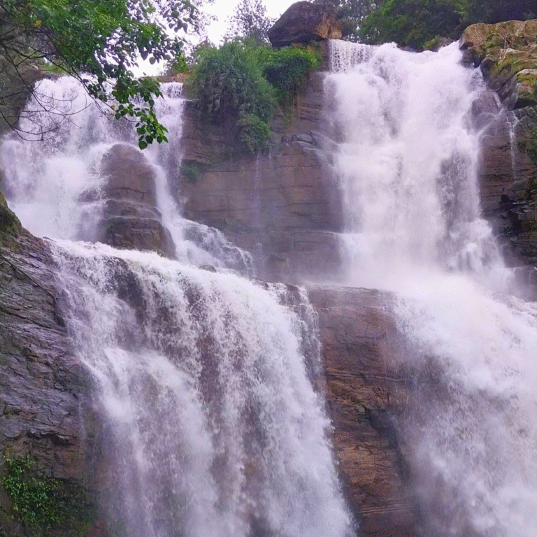 misty morning at Lower Ramboda Ella waterfall in Sri Lanka