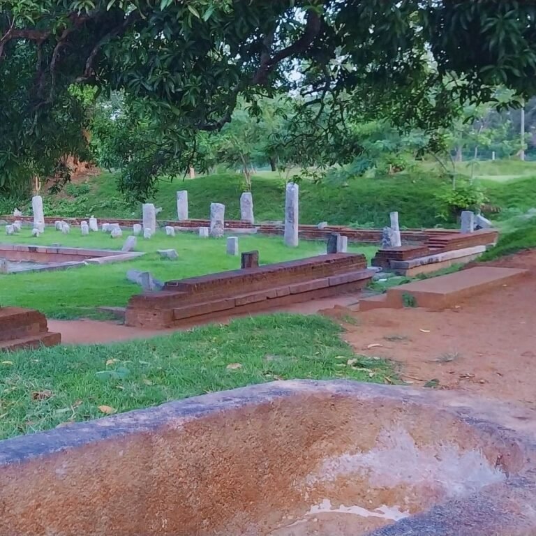 Ancient monastery hall with stone carvings in Mahavihara