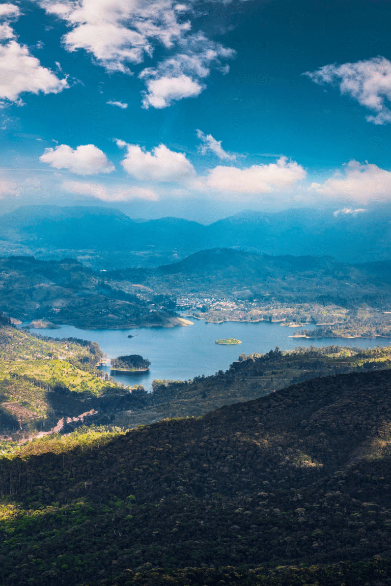 Scenic view of Maussakelle Reservoir in Sri Lanka surrounded by green hills