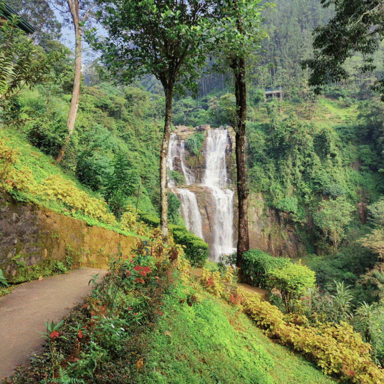 scenic view of Ramboda Ella waterfall surrounded by greenery