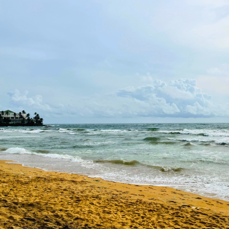 Sri Lankan beach scene with waves crashing at Mount Lavinia