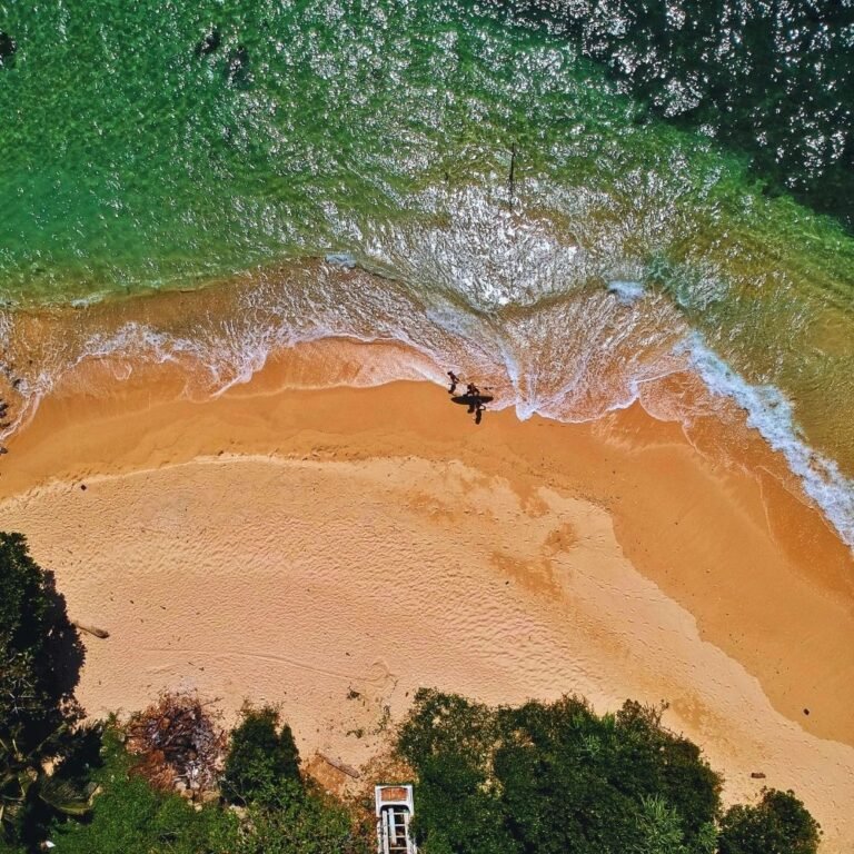 Waves crashing on the shore of Midigama Beach