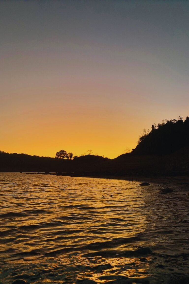 Sri Lanka highland reservoir with lush greenery