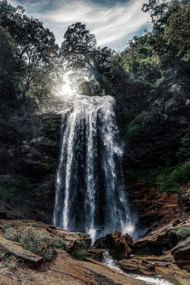 Kabaragala Falls cascading through green forest in Nuwara Eliya