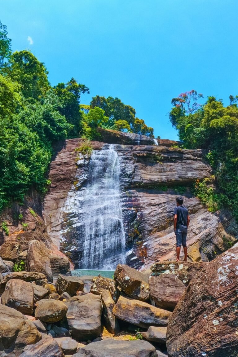 Thaliya Watunu Ella waterfall cascading in lush green forest