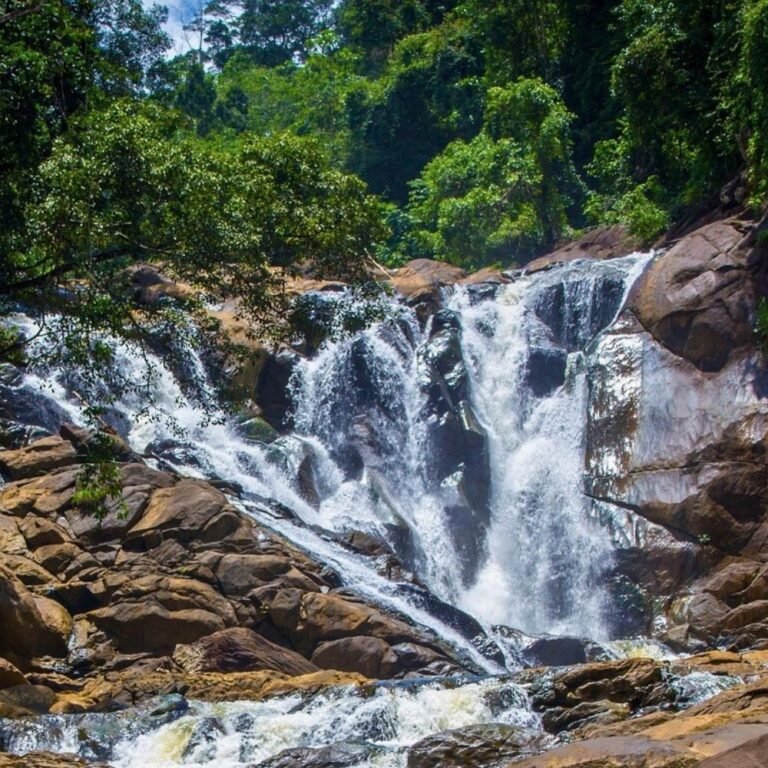 Ethamala Ella Waterfall cascading through lush greenery